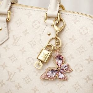 Louis Vuitton Gold Lock 🔒 Authentic LV Key + Unbranded Butterfly Bag Charm